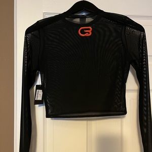 Cyclebar sheer crop lotus top